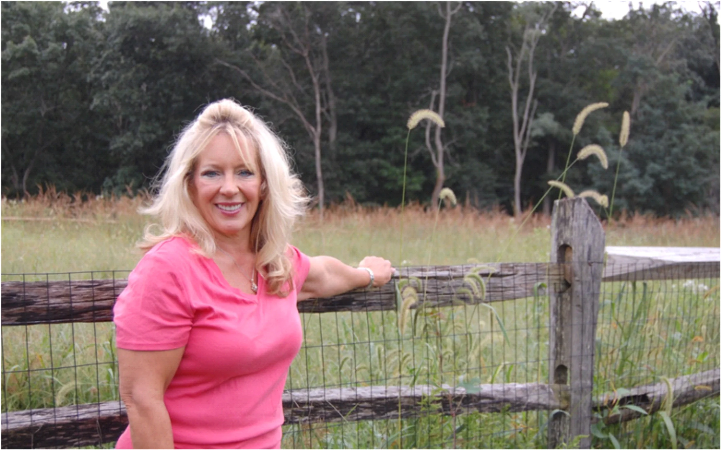 Valerie Montecalvo enjoying the pollinator meadow at her Spy Hill property in Middletown.