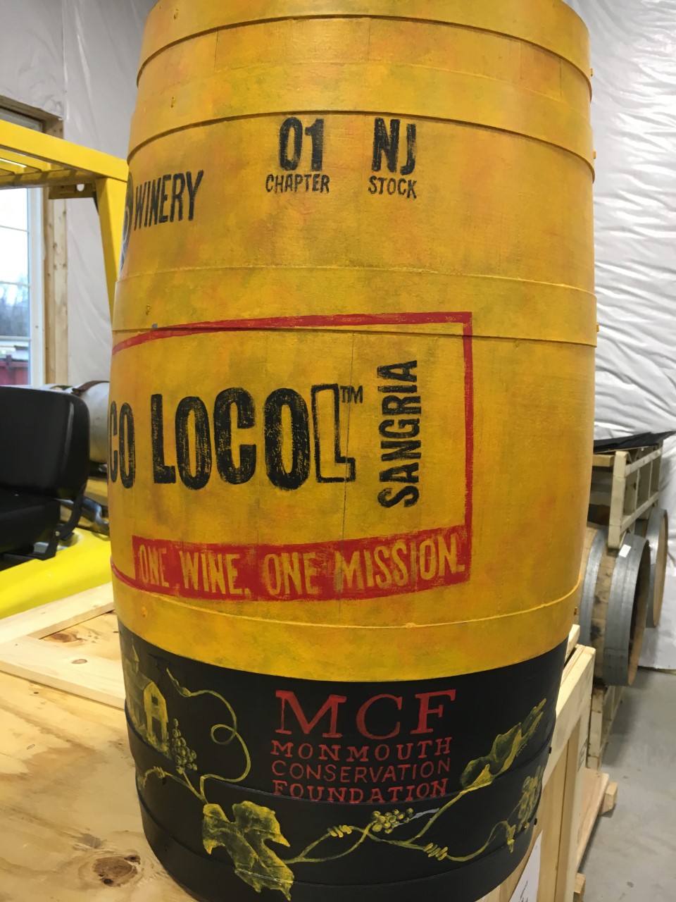 This beautiful wine barrel was custom painted to display the label of Poco Locol sangria, each bottle displays the MCF logo and mission to protect local farms.