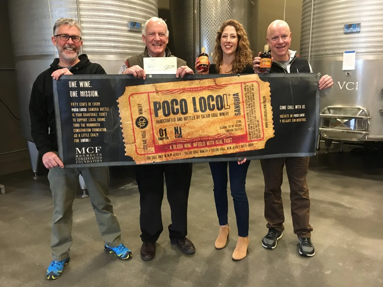 Jerry Amabile, William Kastning, Amanda Brockwell and Tim Schlitzer. Jerry and Tim present MCF with a donation check from the sales of Poco Locol sangria. Thanks Cream Ridge Winery!