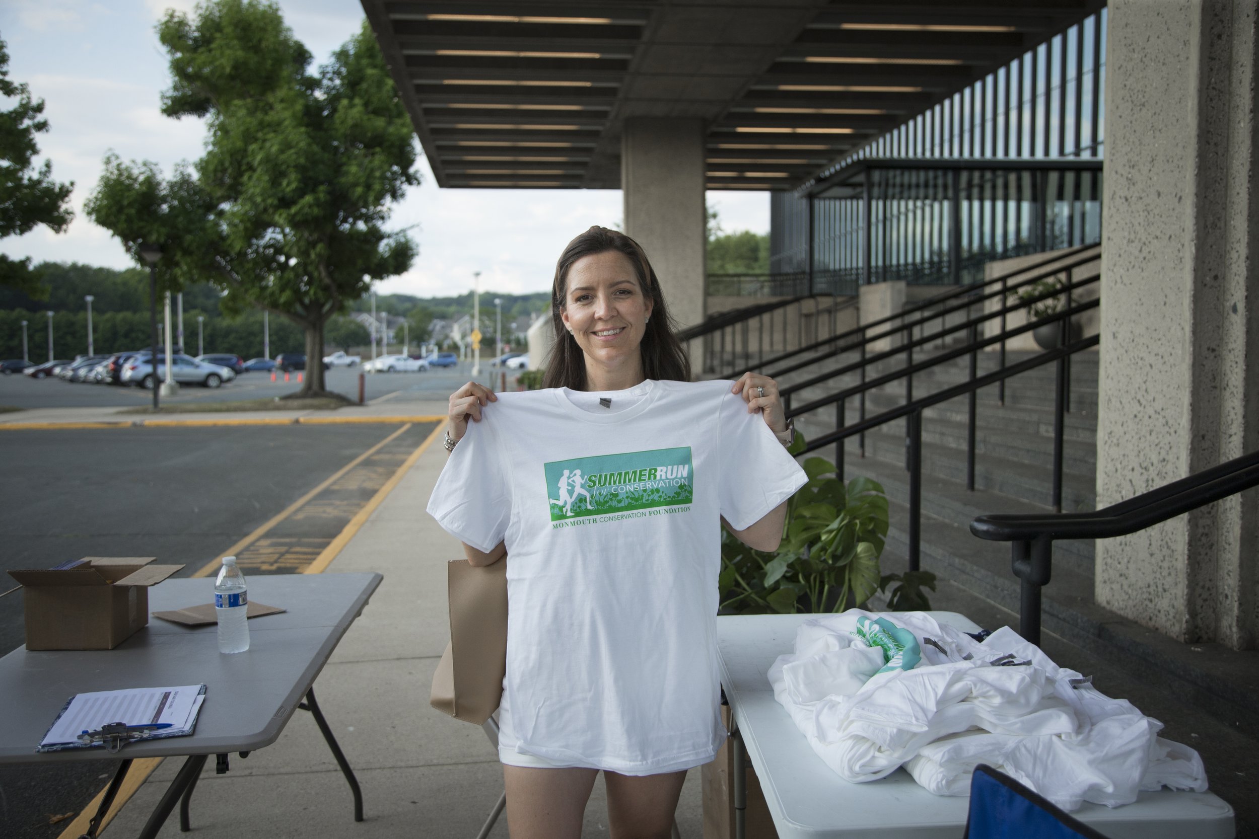 Karen Holding up Race T-shirt.jpg