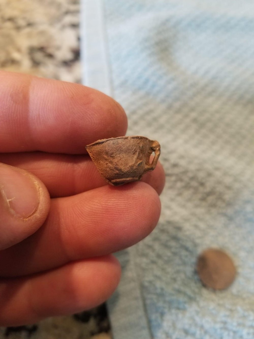 Miniature pewter tea cup, likely a child's toy, found by John Hunt. At the event, John's young son won a metal detector during the raffle, and is now a passionate relic hunter!