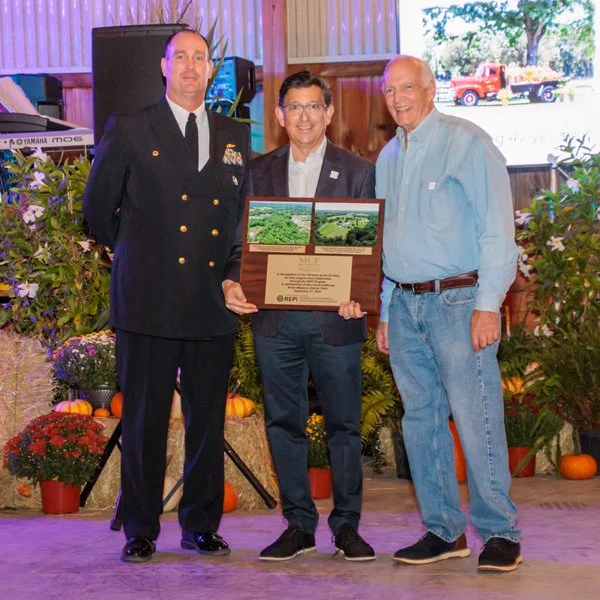 L-R: NWS Earle Commanding Officer Capt. Kent D. “Brewski” Smith, MCF President Matthew Cohen, and MCF Executive Director William D. Kastning