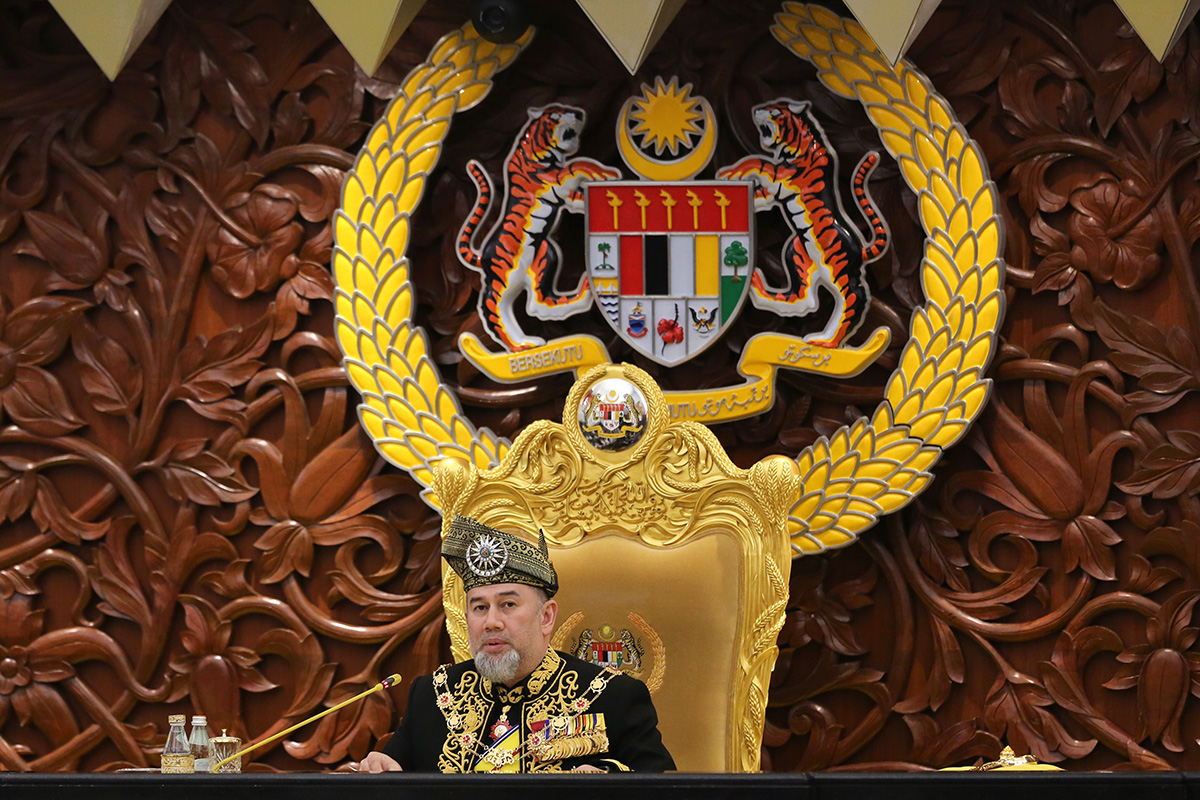 Malaysia King Sultan Muhammad V delivers the opening speech during the opening of the 14th parliament session at the Parliament house in Kuala Lumpur, Malaysia, Tuesday, July 17, 2018. (AP Photo/Yam G-Jun)