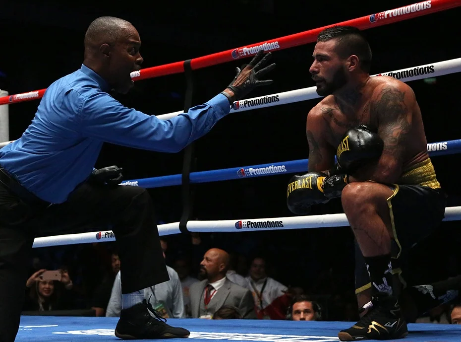 Manny Pacquiao of the Philippines, left, celebrates after defeating Lucas Matthysse of Argentina during their WBA World welterweight title bout in Kuala Lumpur, Malaysia, Sunday, July 15, 2018. (AP Photo/Yam G-Jun)