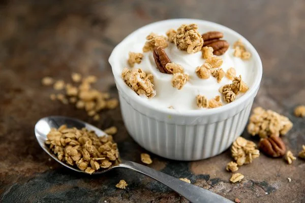 1. Low-fat Greek yogurt topped with granola and nuts