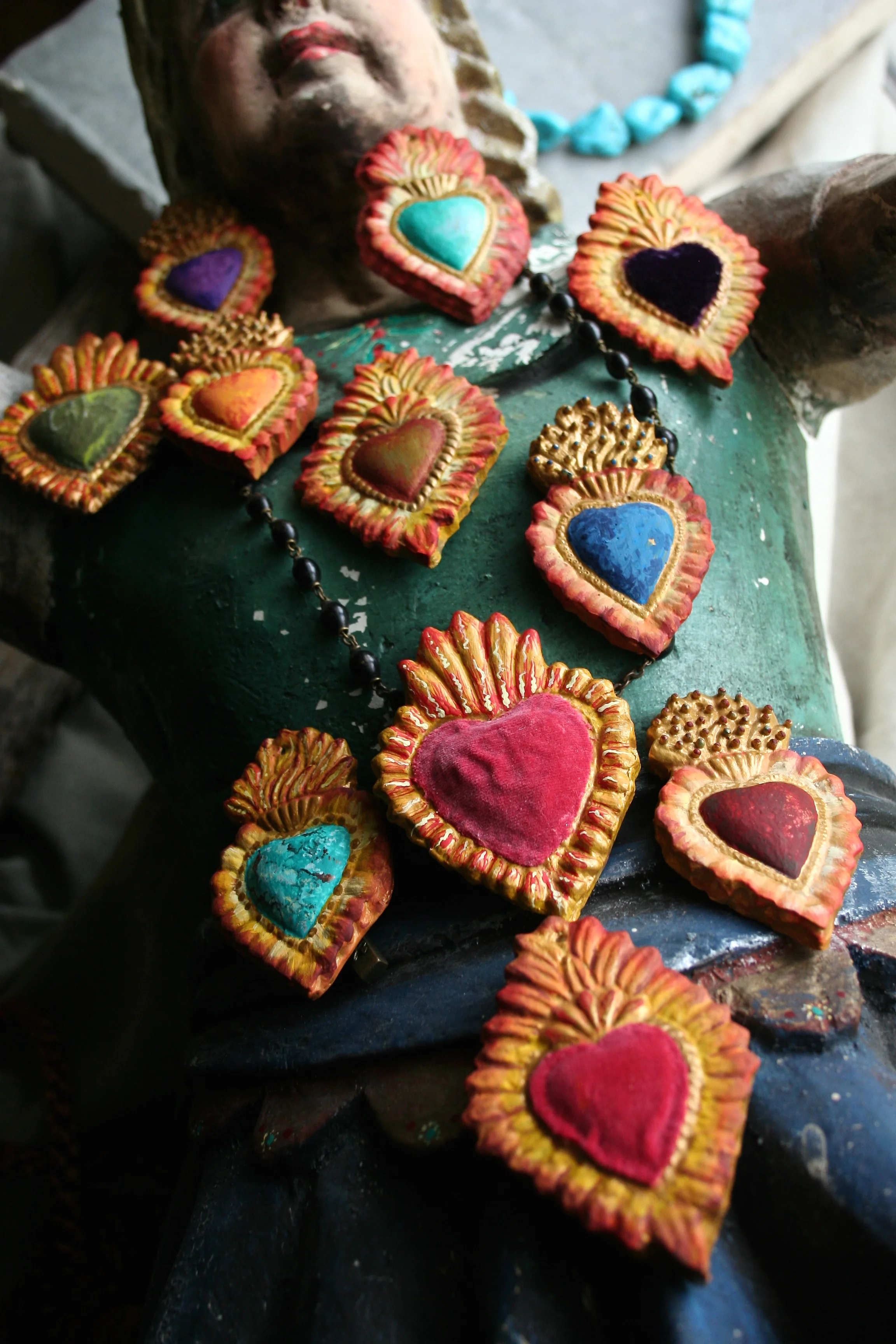 They are folk charms traditionally used as offerings, 