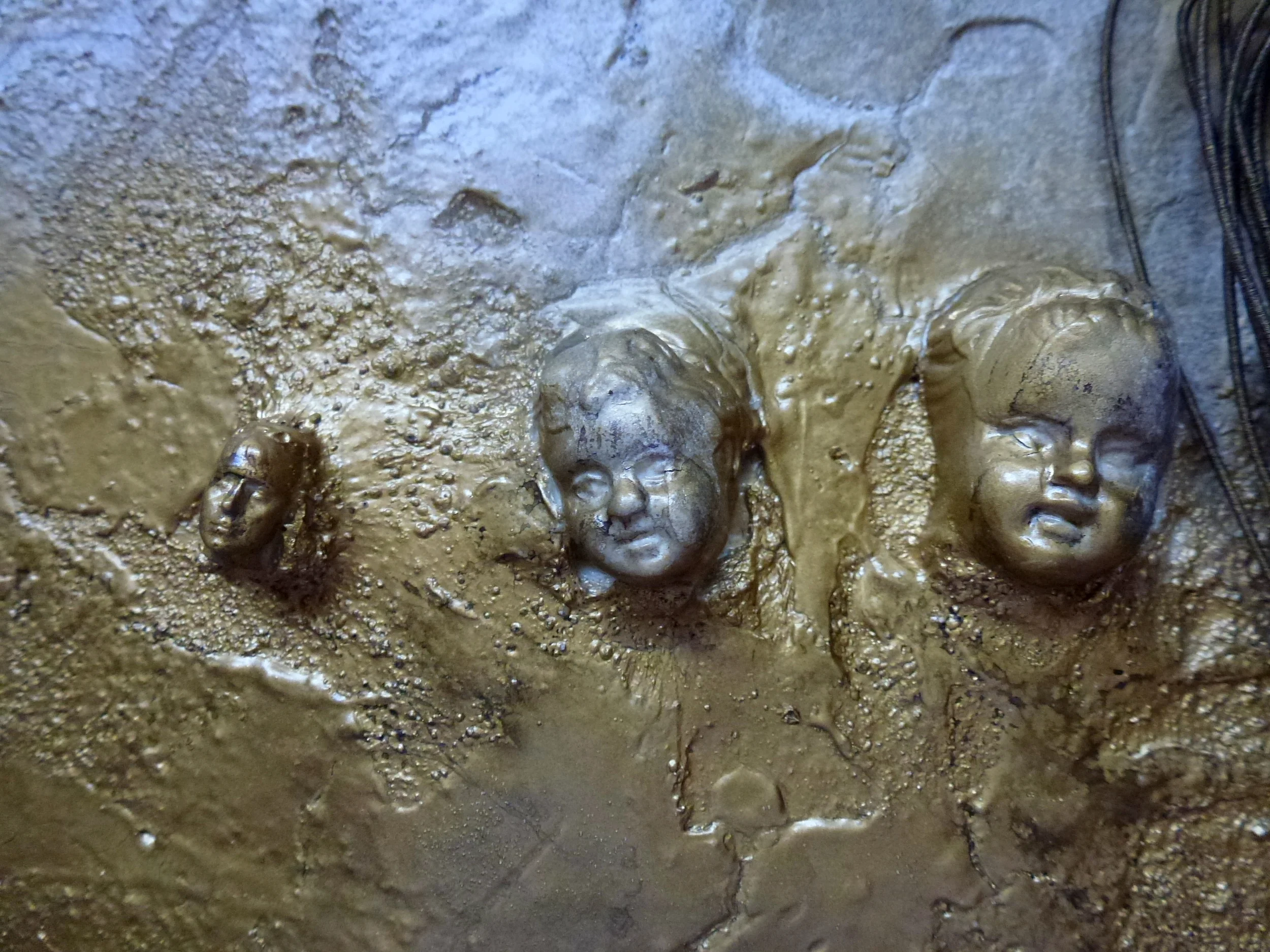 Using the same technique highlight the facial features of the Figureheads. To complete seal the layout with artist grade matte sealer and adhere photo to centre ofwire thread frame using adhesive foam dots and extra strong glue on the underside of the foam dots.