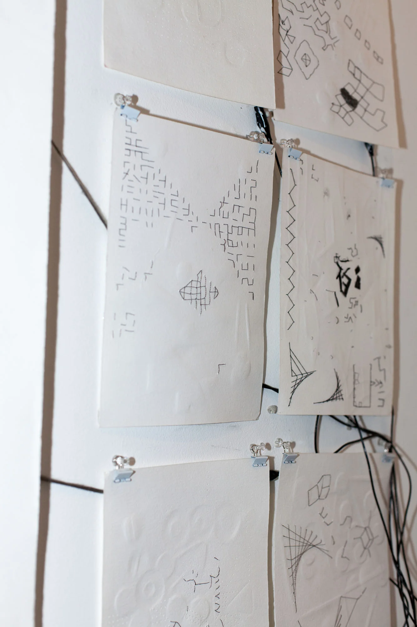 Thread (detail) 2017 | Fingernail burnished, pin pricked cotton rag paper, stainless steel fibre, micro controller, speaker | Dimensions variable