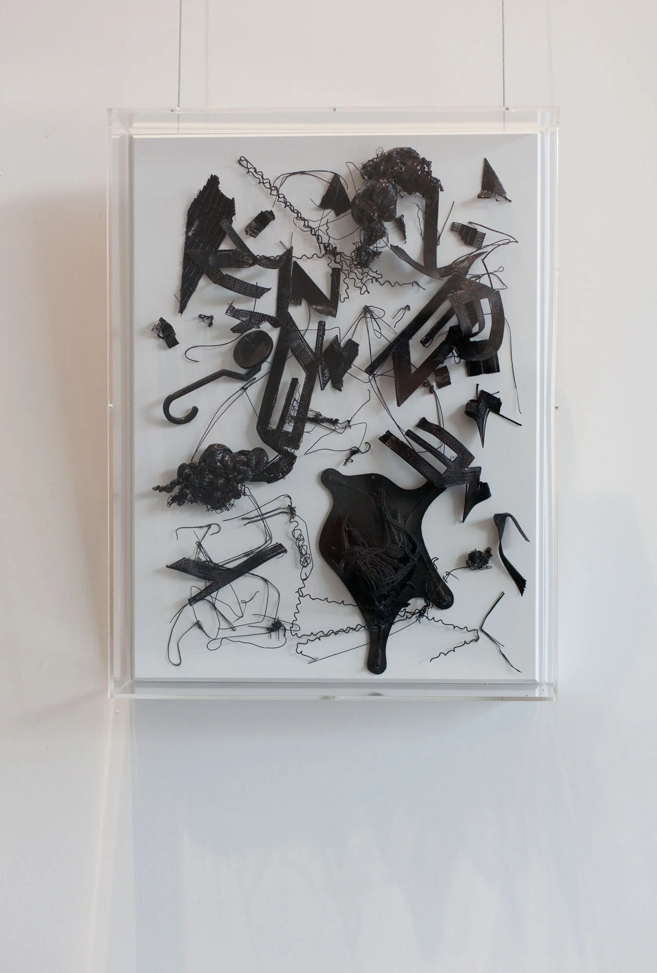 Tina Douglas, grating 2019, 3D printed plastic errors on ragboard, 37.6 x 28.5 x 6 cm with acrylic box