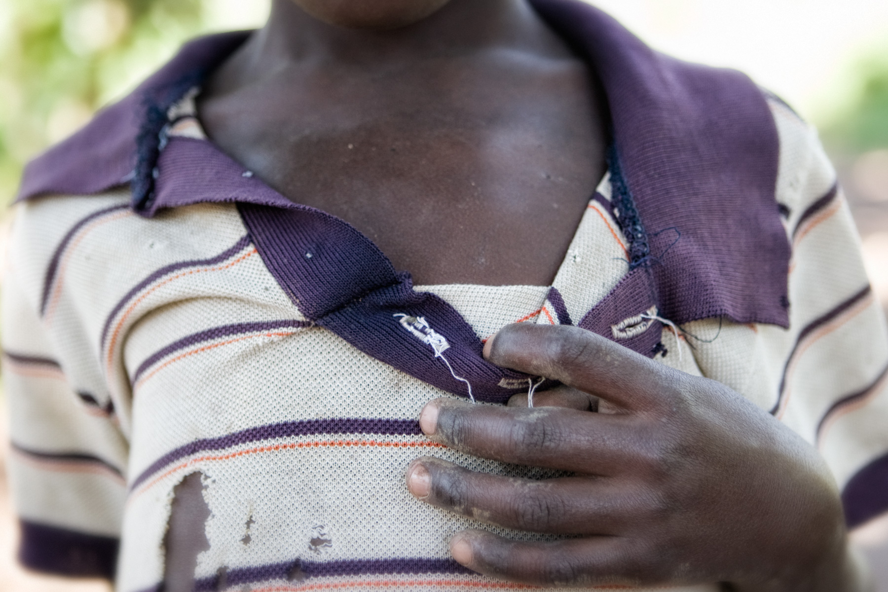 Kyotera, Uganda. Families ripped apart by AIDS. Orphans, poverty, hunger, the elderly caring for the young. Smiles and joy still occur.