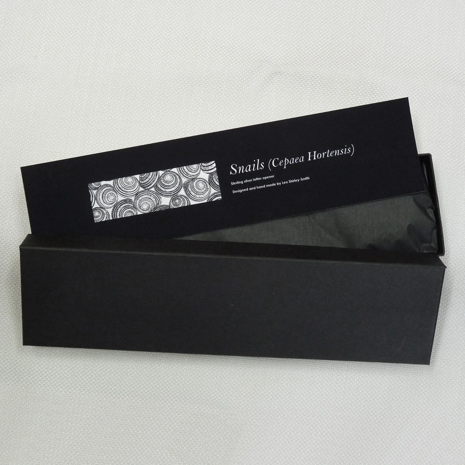 Silver letter opener by Leo Shirley-Smith "Snails (Cepaea hortensis)" design - Box
