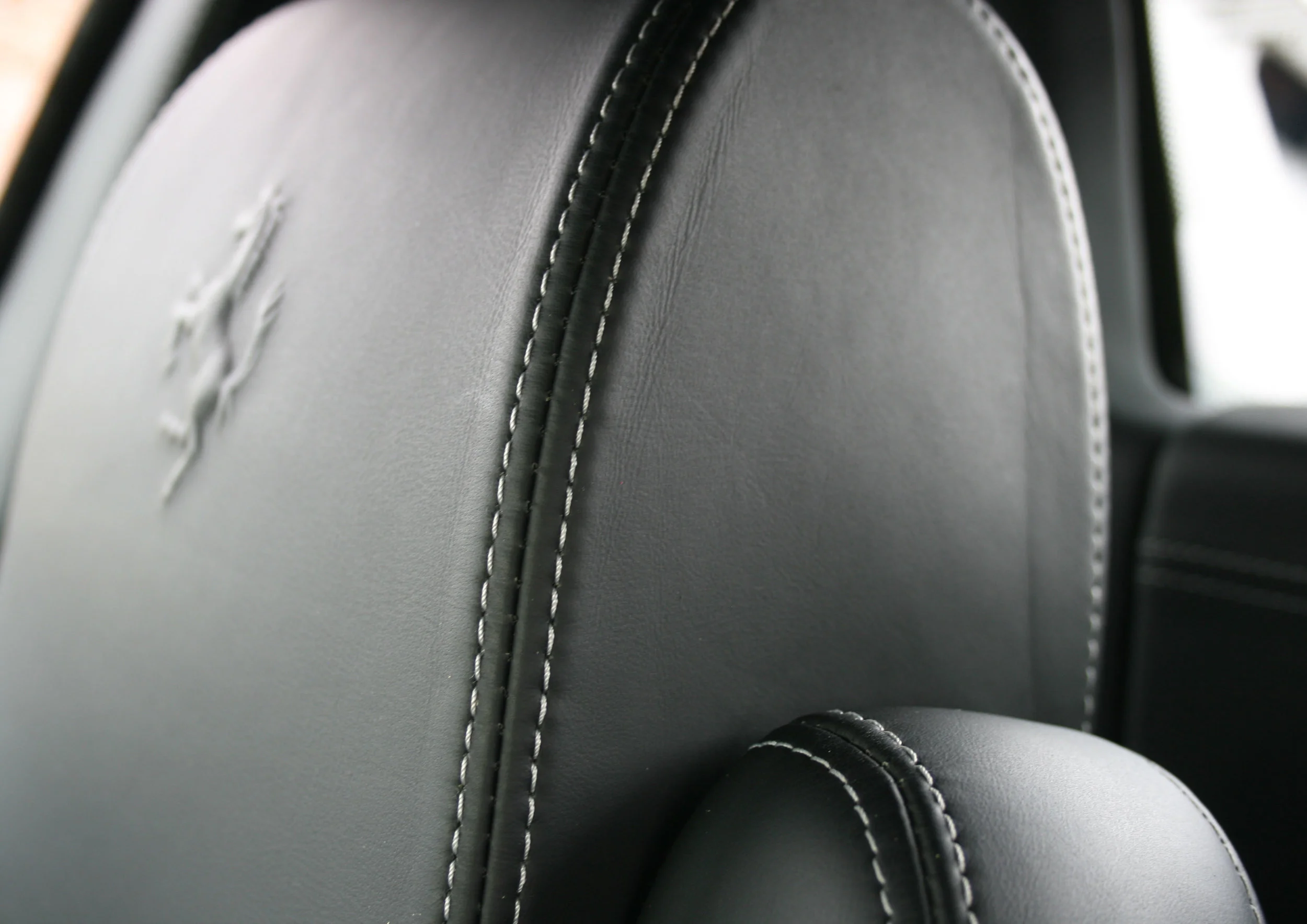DETAIL EMBOSSED HEADREST.jpg