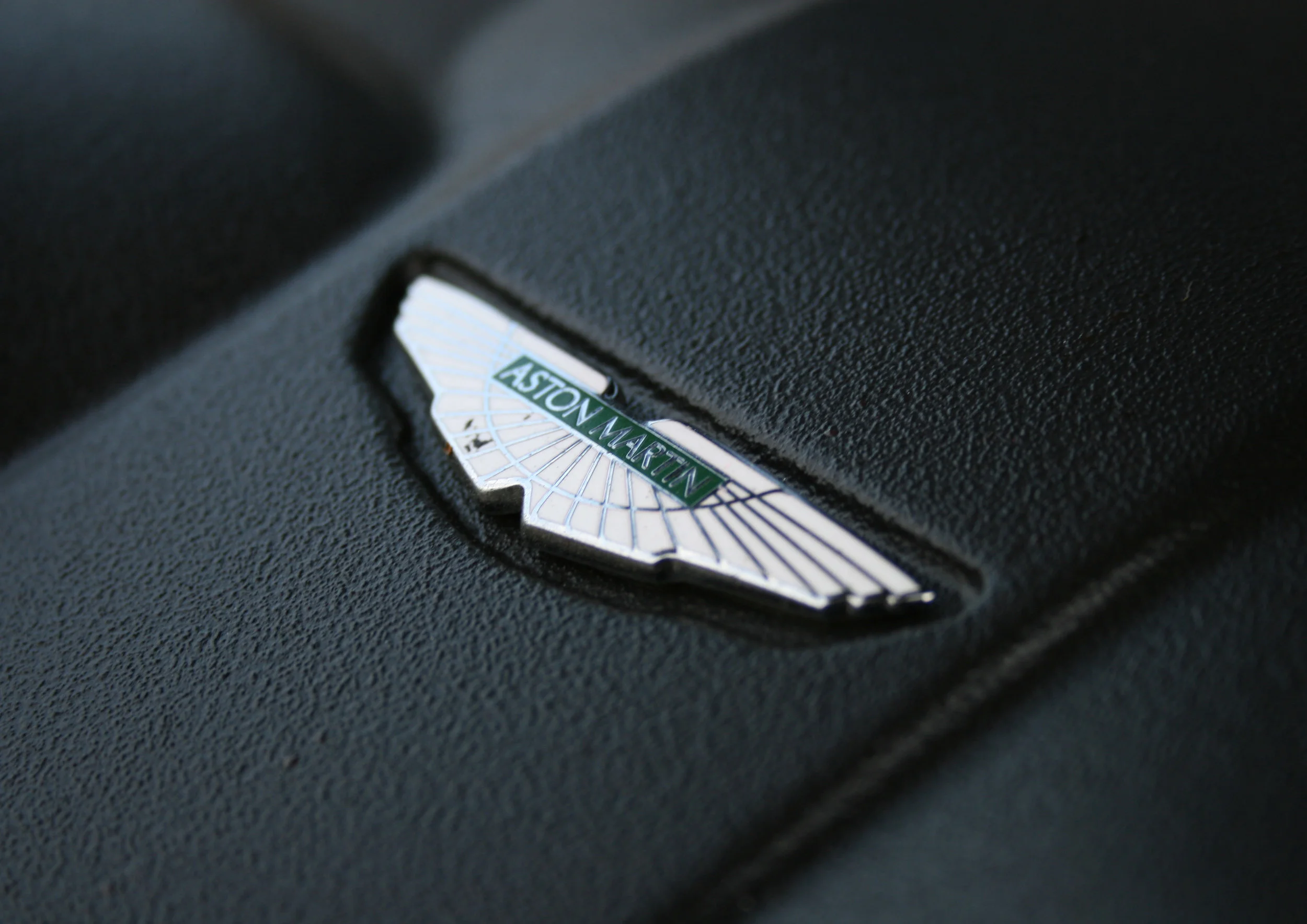 DETAIL ASTON BADGE ENGINE.jpg