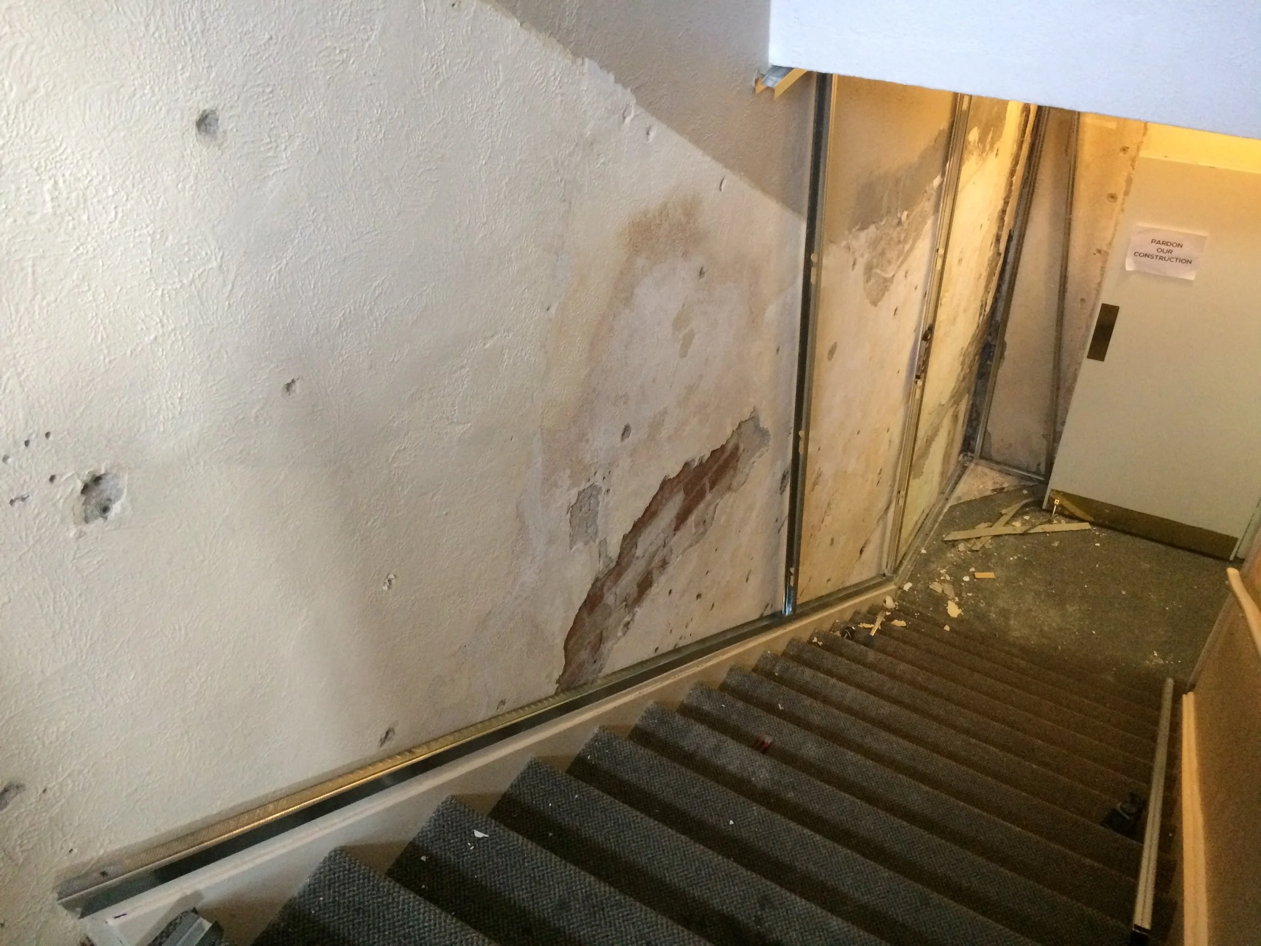 Water damage from seepage: We spent $15K fixing the outside before verifying this dried up the problem - at least for now. This picture shows new metal studs being put in place for a drywall covering. (The $15K "fix" was less than the big fix of $50K. Yikes.) 