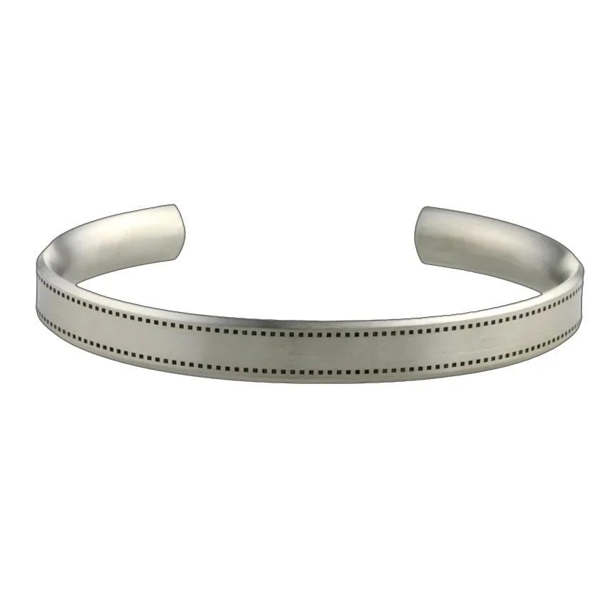 8MM WIDE STITCH PATTERN TITANIUM BANGLE