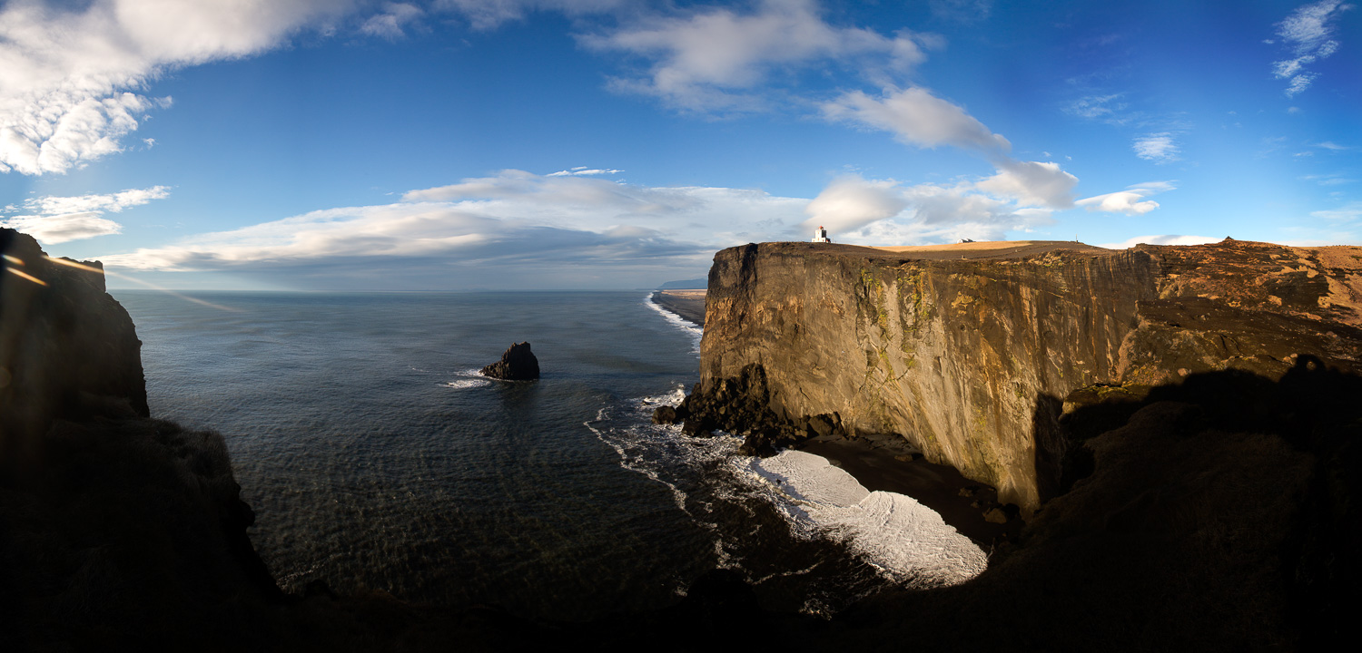 Massive Rock Formation with the Dyrhólaey Lighthouse on top, Iceland