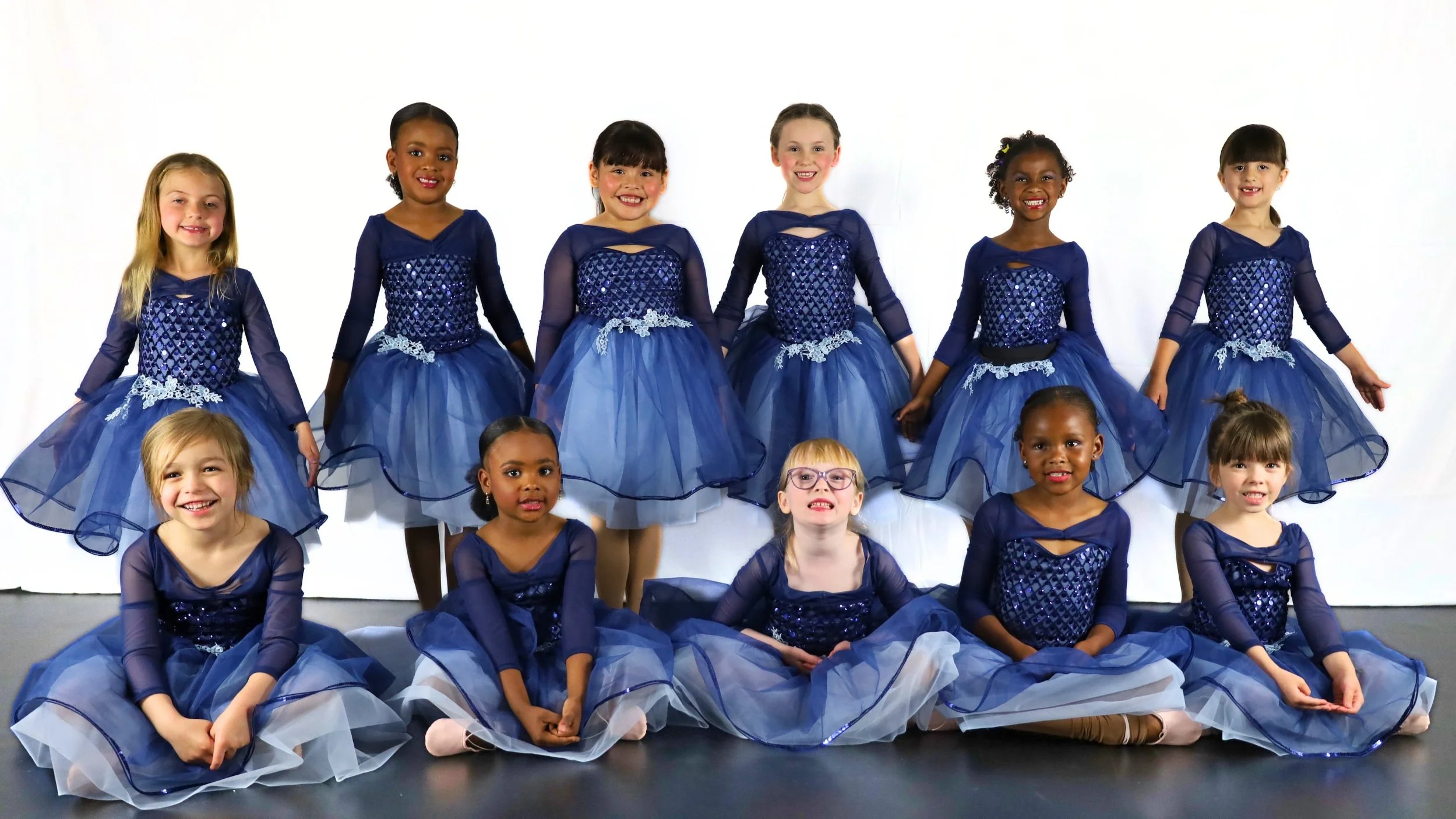 Smiling dancers in Tulsa dance studio