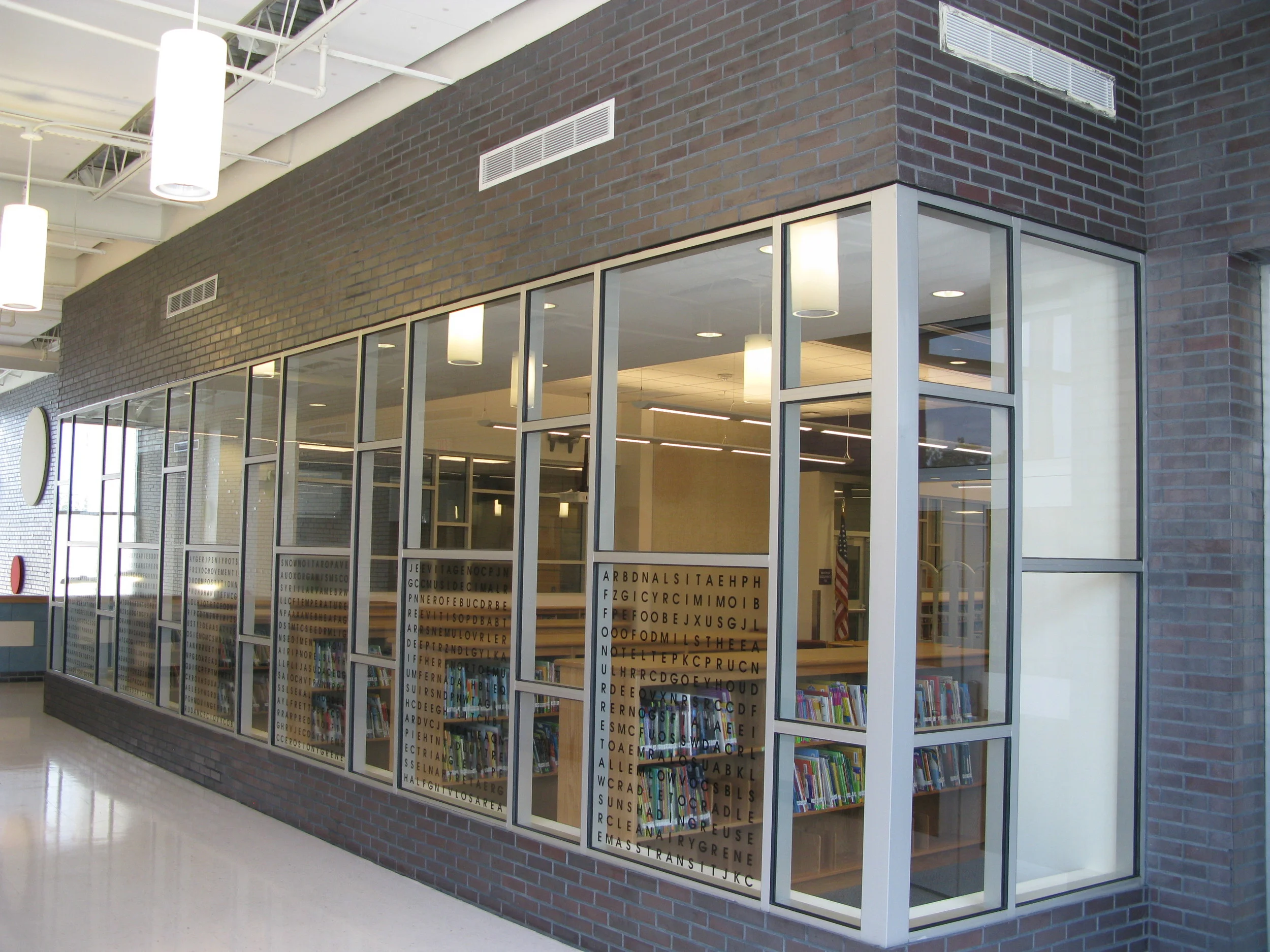  Just at the top of the grand stair windows open up to the library.&nbsp; 