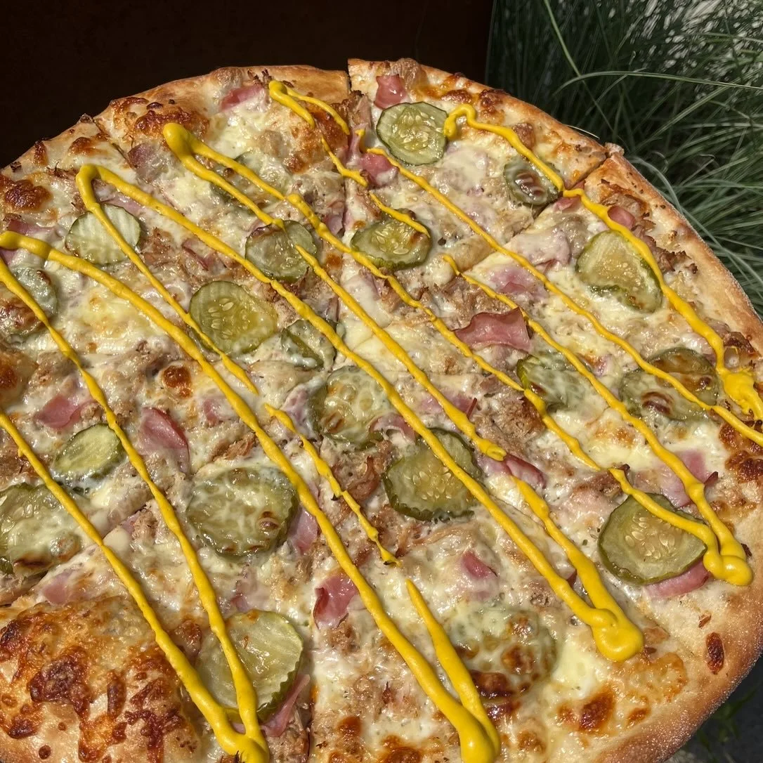 Open on Labor Day regular hours. September pizza is the Cubano! Garlic olive oil base + mozzarella + citrus marinated pork + ham + pickles + swiss + yellow mustard drizzle. Available in Germantown and Deer Park 🍻 
#pizzaofthemonth #september #cubano