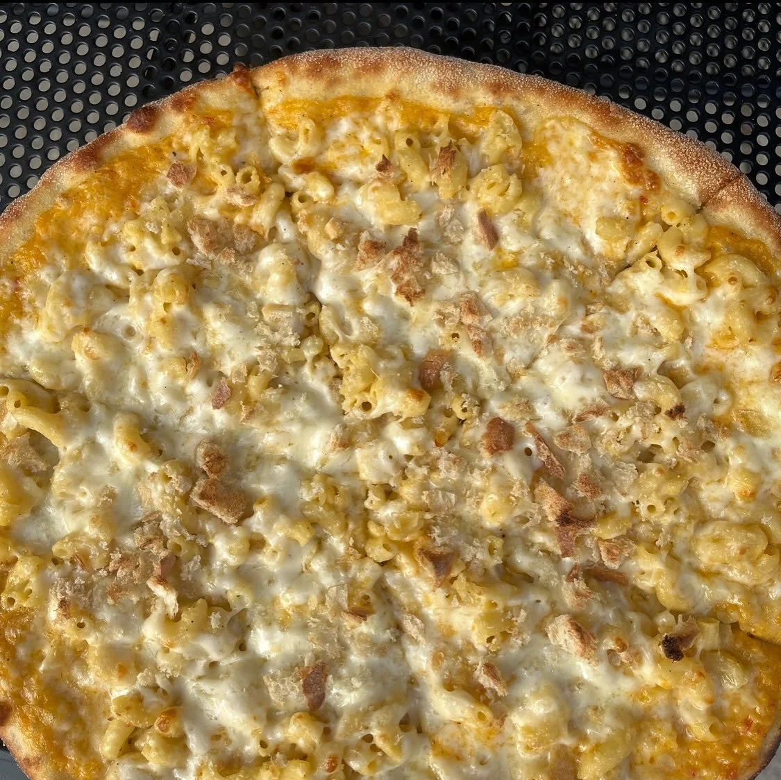 Mac &amp; Cheese pizza available for the month of October. Beer cheese base + mozzarella + mac &amp; cheese + breadcrumbs. Available in Germantown and Deer Park. 
#pizzabeervictory #october #pizzaofthemonth #cheesy #macandcheese #beercheese