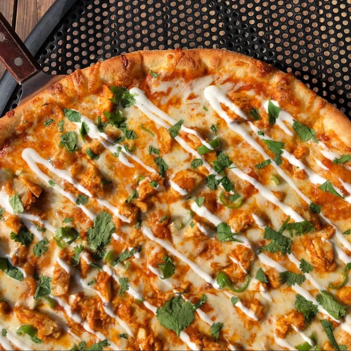 Its Tikka Time!! Tikka Masala available for the month of April. Tikka Masala sauce base + marinated chicken + mozzarella + diced Serrano pepper and topped with yogurt drizzle + cilantro.