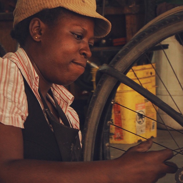 While the bikes are enjoying a relaxing cruise across the Atlantic, probably dancing all nite and eating shrimp, we'd like to introduce you to Mirriam Agyeiwaa. She's one of the amazing mechanics at Ability Bikes in Koforidua, the capital of the East