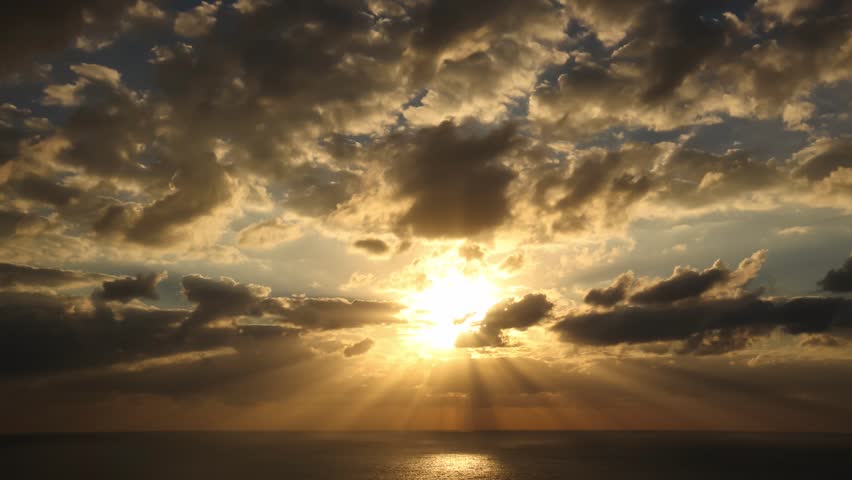 Sun-rays-through clouds.jpg