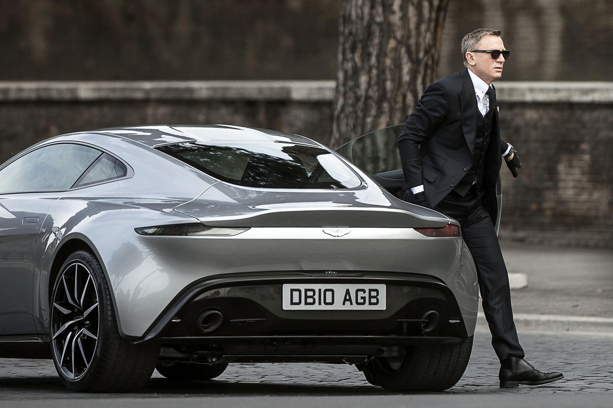 Bond walking away from his all new Aston Martin DB10