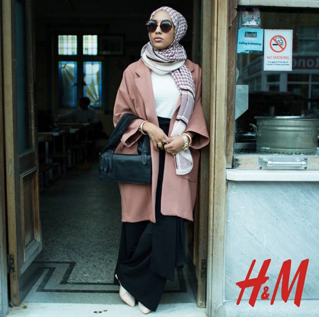 H&M's 2015 Fall collection was led by Maria Hidrissi, dressed in round sunglasses, black palazzo pants, a pink coat, and a checked hijab. The campaign is a step away from stale family stereotypes in acknowledging diversity in the women's market.