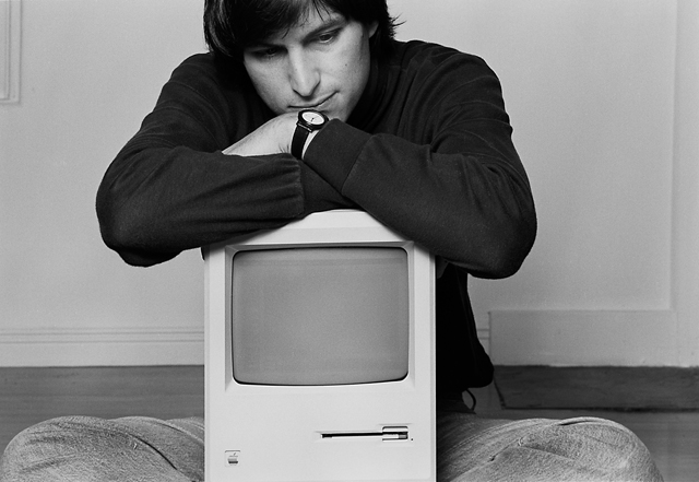 Steve Jobs, pictured here in the 1980's with an early version of the Macintosh, managed to retain his child-like optimism.
