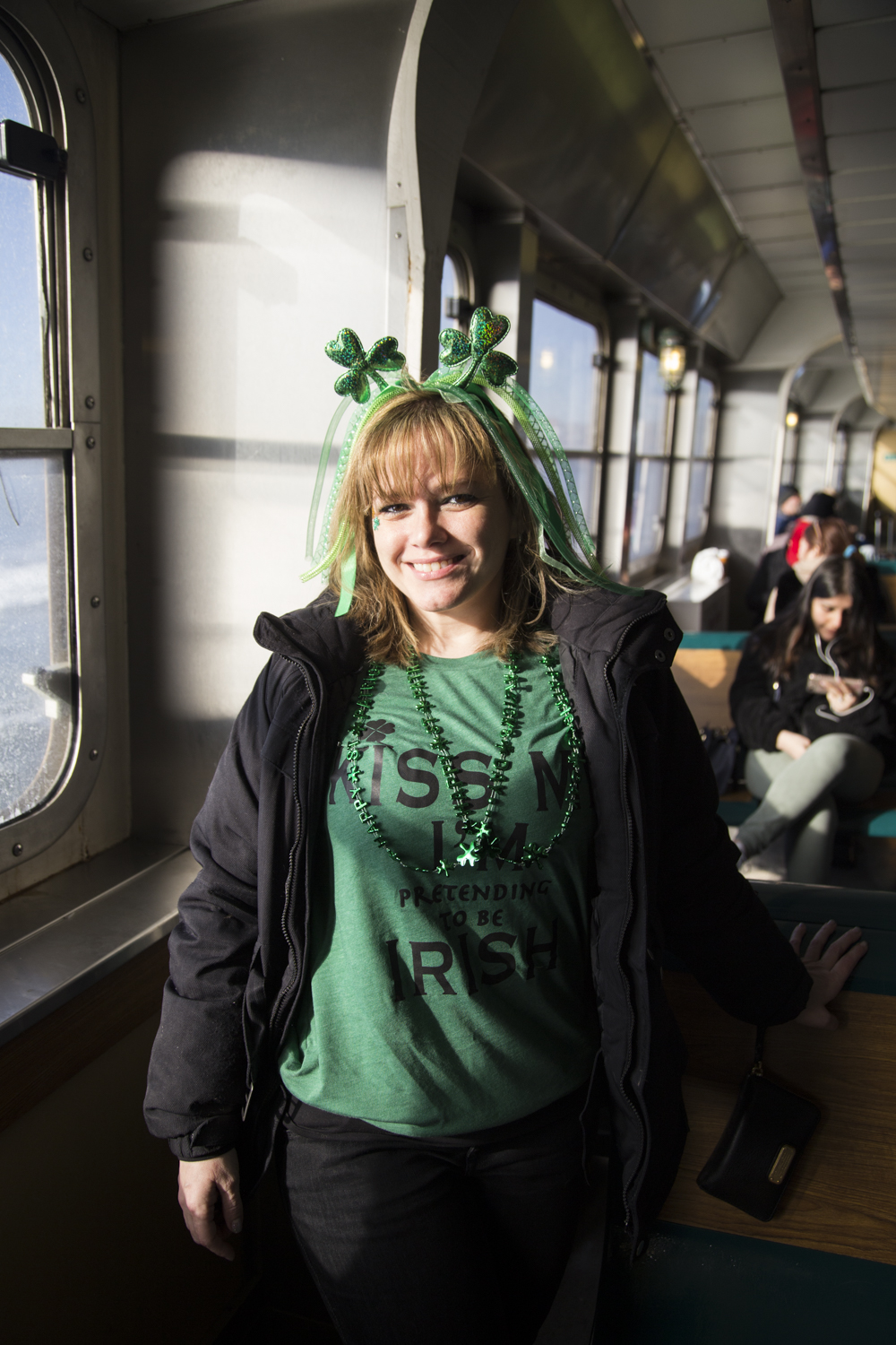 Luz Morales from Manhattan rides the Staten Island Ferry to Manhattan for the St. Patrick's Day Parade. (Staten Island Advance/Shira Stoll)
