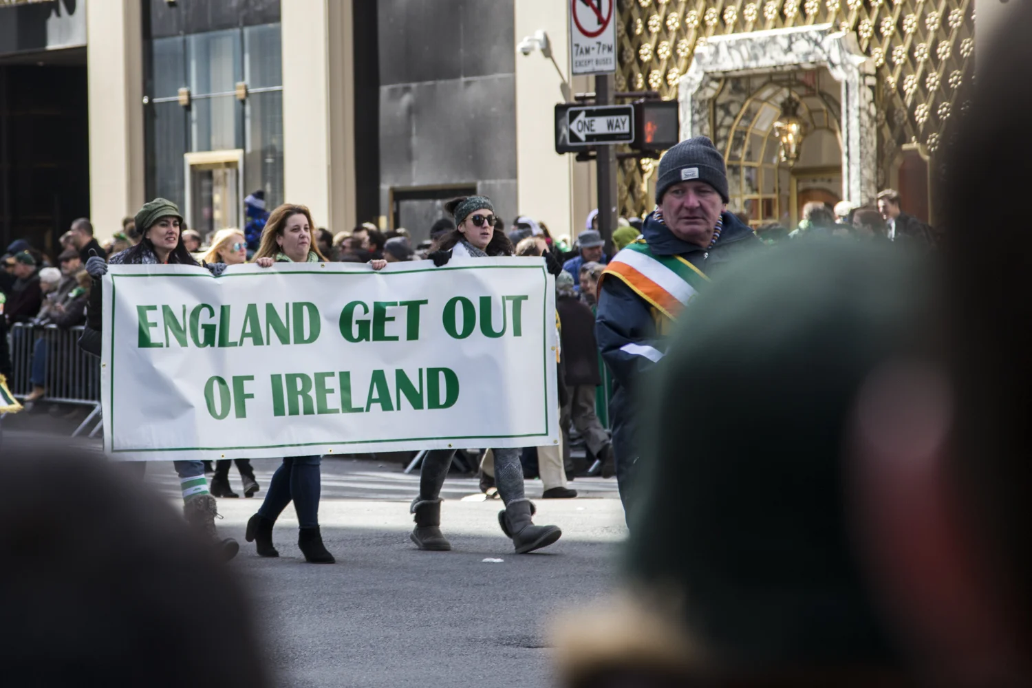 Women marching in the St. Patrick's Day Parade in Manhattan and holding a sign which reads "England Get Out of Ireland." (Staten Island Advance/Shira Stoll)