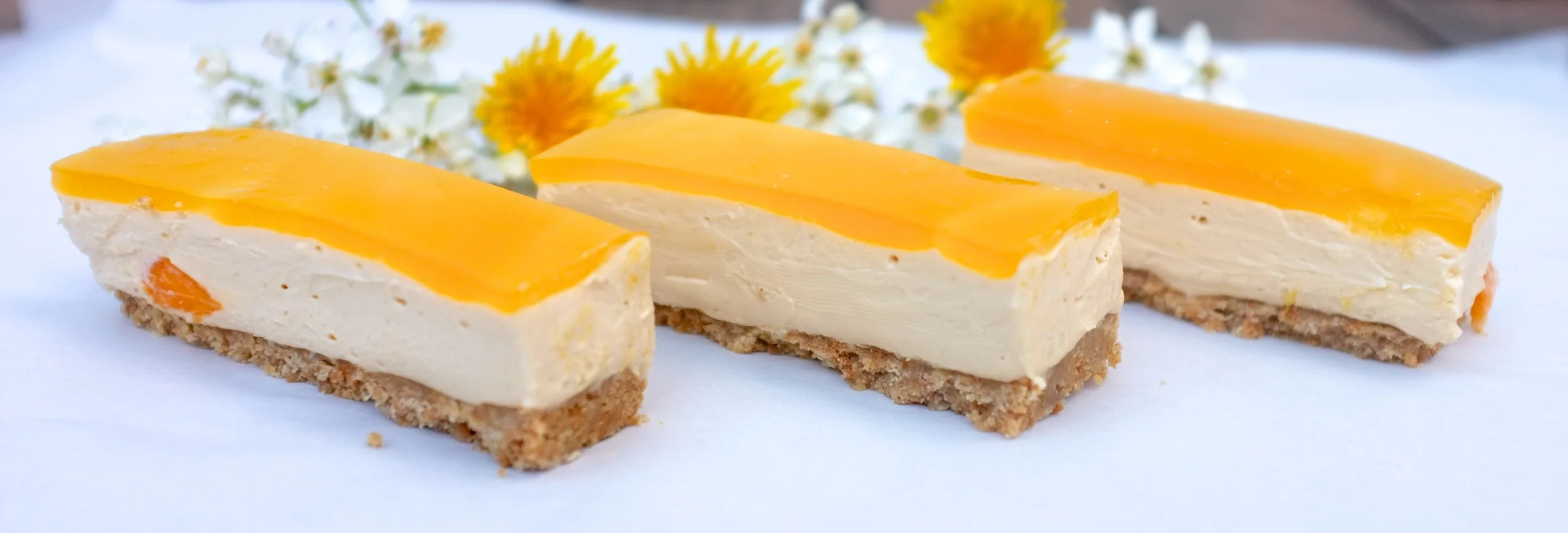 Caramelised White Chocolate, Passion Fruit & Mango Cheesecake