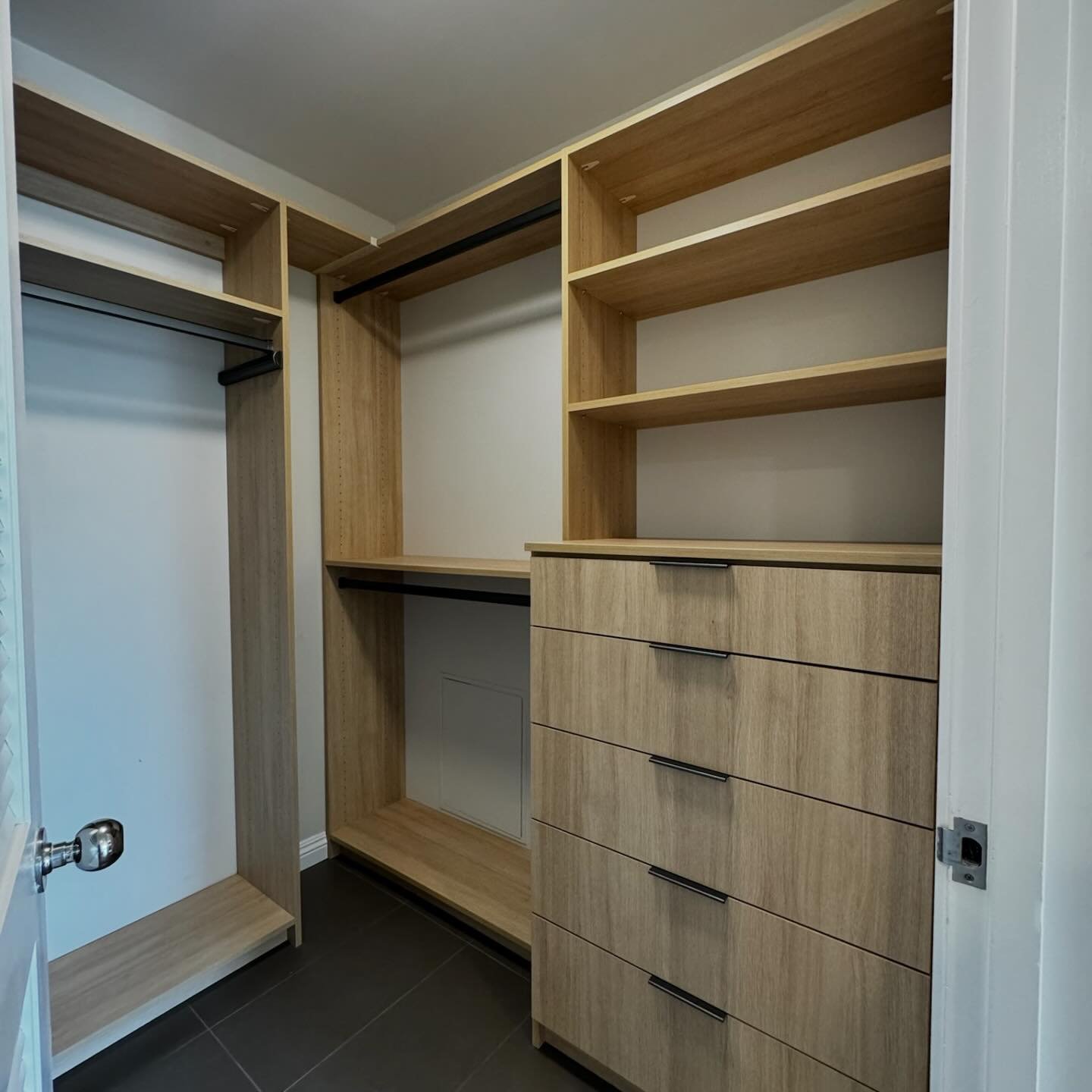Maximizing storage in a condo can be a challenge but making it work in odd and angled condo spaces are tricky.  These closet spaces had to be custom due to the existing structure and obstacles, and built with the same material as the custom cabinetry