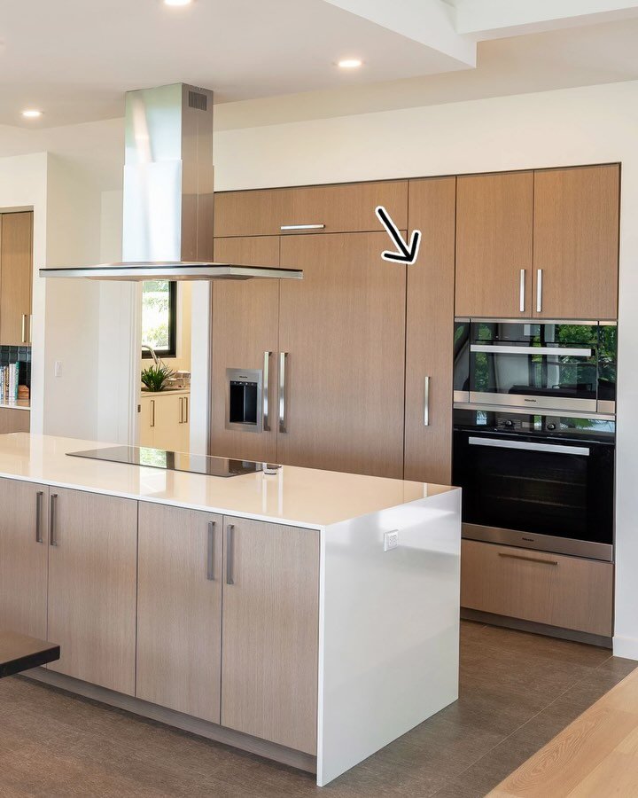 Make every inch of the kitchen work for you.  Between the refrigerator and wall oven is a narrow cabinet with a pullout pantry system.  Our Kessebohmer line of accessories (made in Germany) can help with maximizing storage.

Shown:  the Dispensa pant