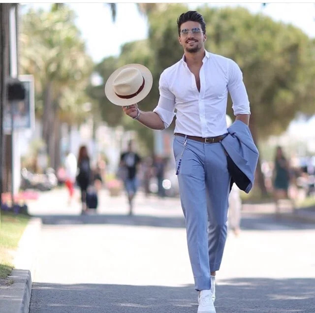 Have fun and play with proportions by styling a menswear version of this classic with a shrunken waistcoat and ankle-high sport socks. 