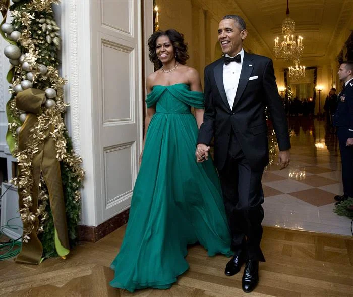 All eyes on the First Lady for the 2013 Kennedy Center Honors Reception in a turquoise jeweled toned Marchesa. 