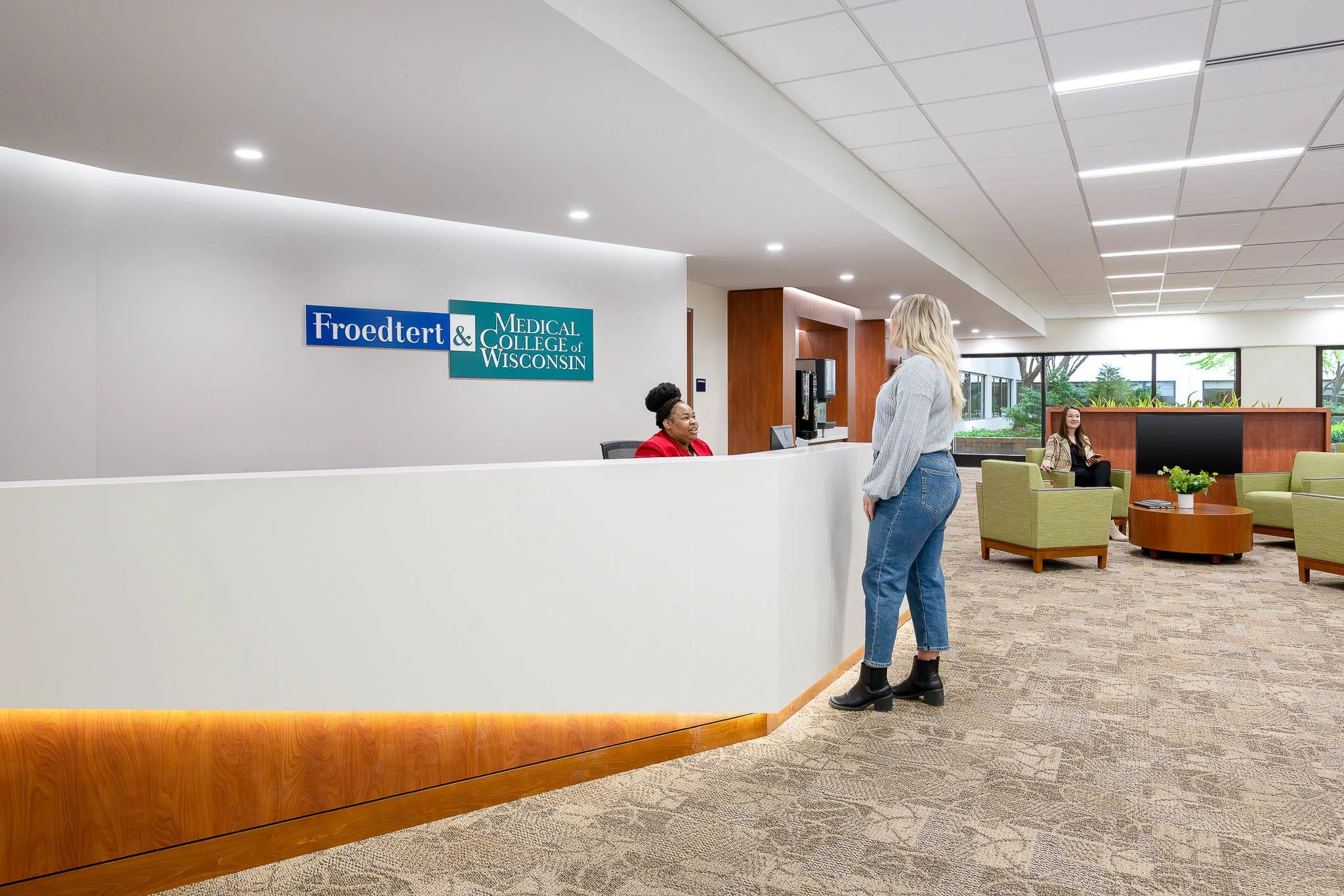 Modern medical college lobby with open atrium, clean lines, and contemporary furnishings — Milwaukee Froedtert and Medical College of Wisconsin commercial interior photography