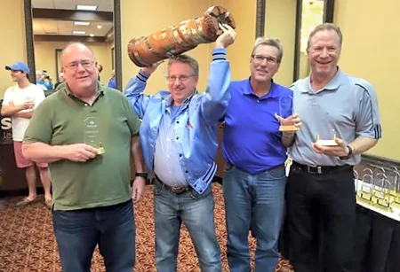 Team Chakis-mate are the champions at the 2016 US Amateur Team South Tournament in Tampa, FL. From L-R, Bob Persante (2200), Peter Dyson (2144) with the Rotating Rook trophy, Larry Storch (2204) and John Nardandrea (2234)