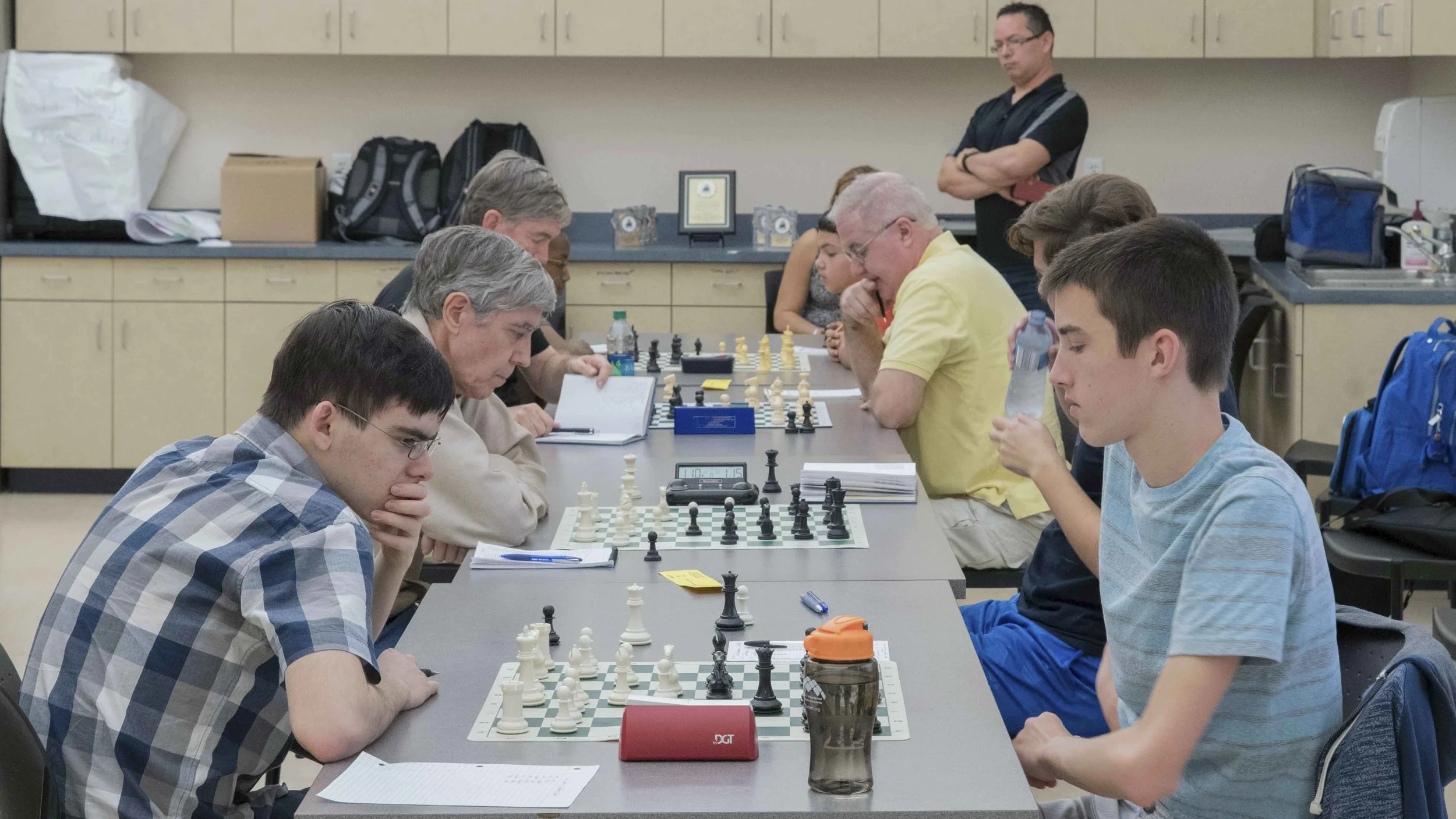 Round 4, Board One, John Ludwig (2463) (L) versus Theo Slade (2177) (R) during the CFCC Club Championship hosted by the UCF Chess Club.