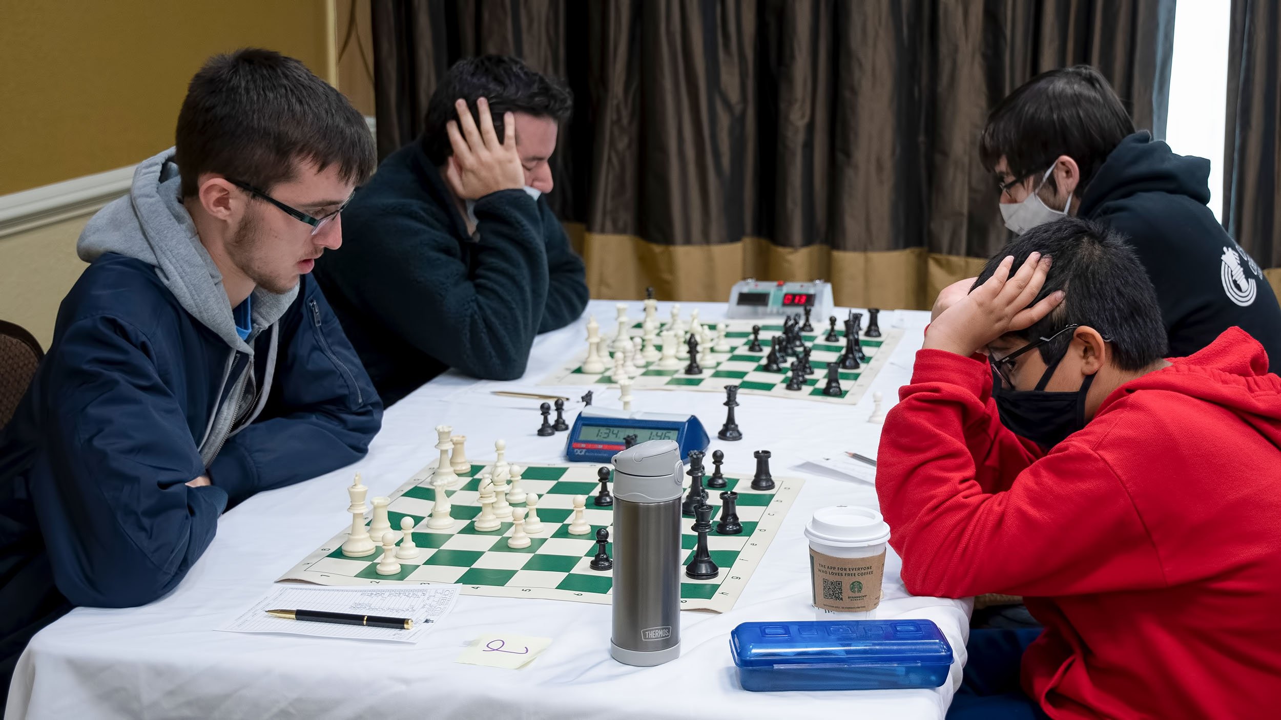 Students check out the CCPS winter chess tournament