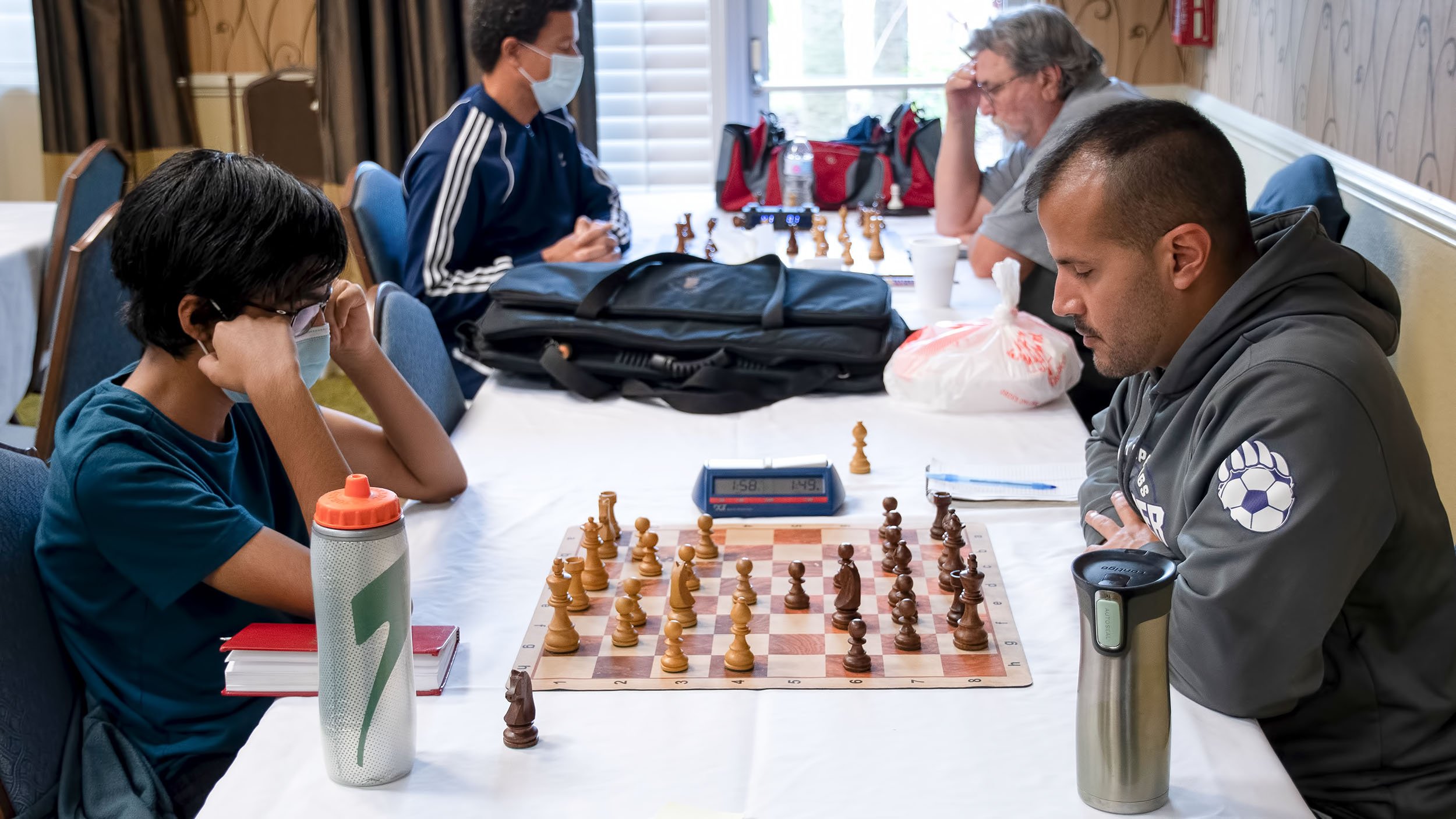 Students check out the CCPS winter chess tournament