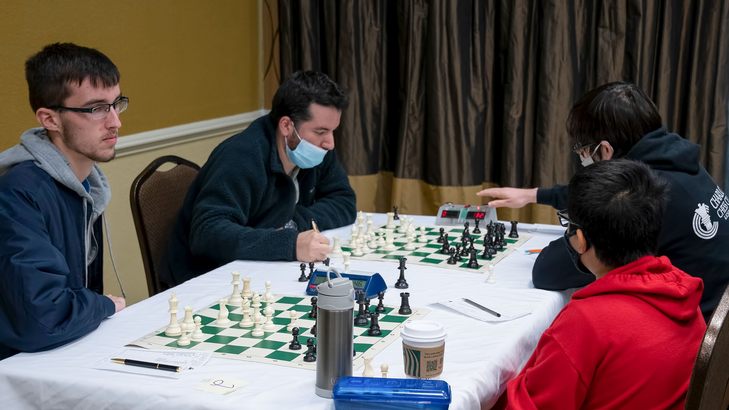 Students check out the CCPS winter chess tournament