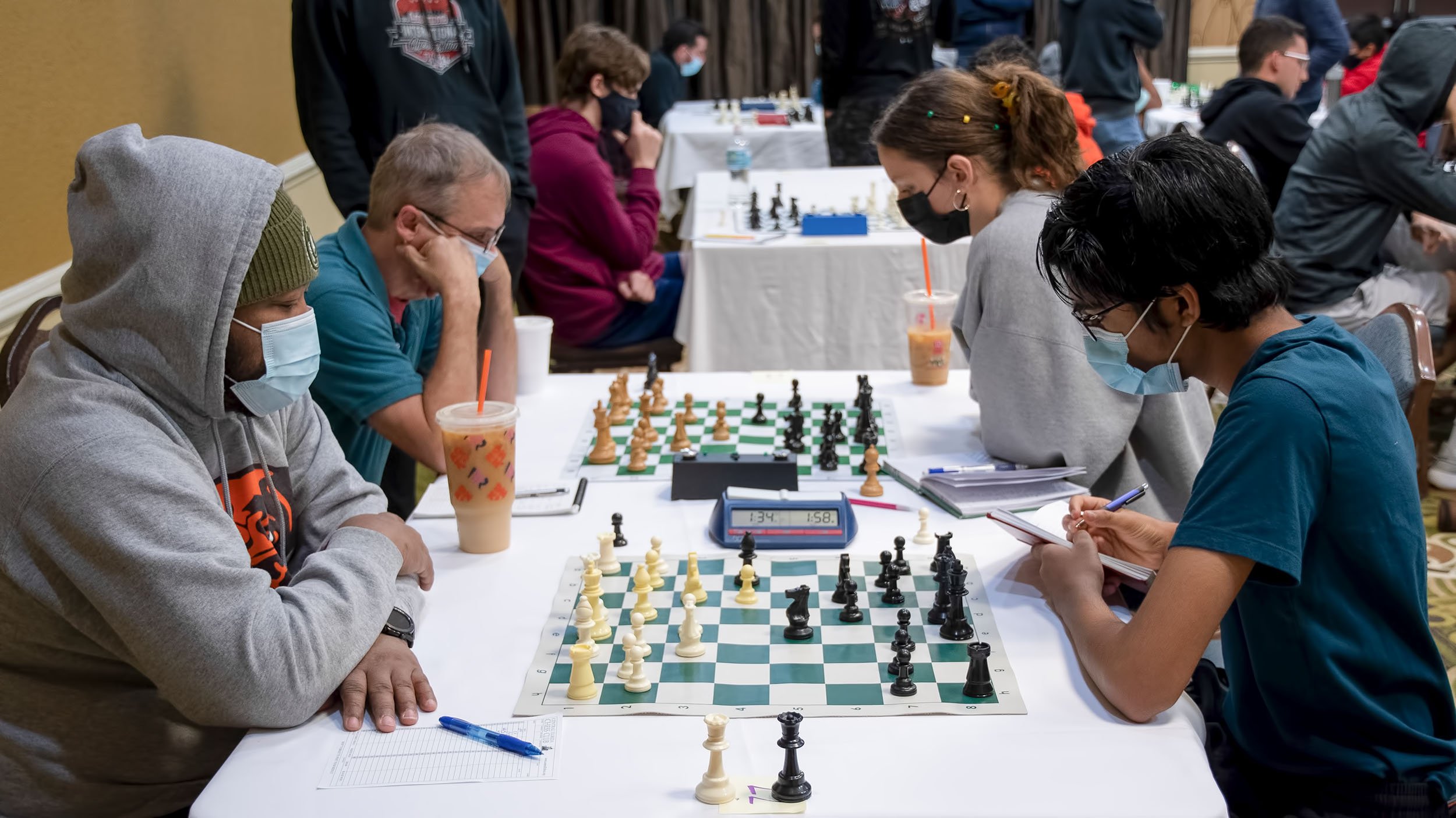 Students check out the CCPS winter chess tournament