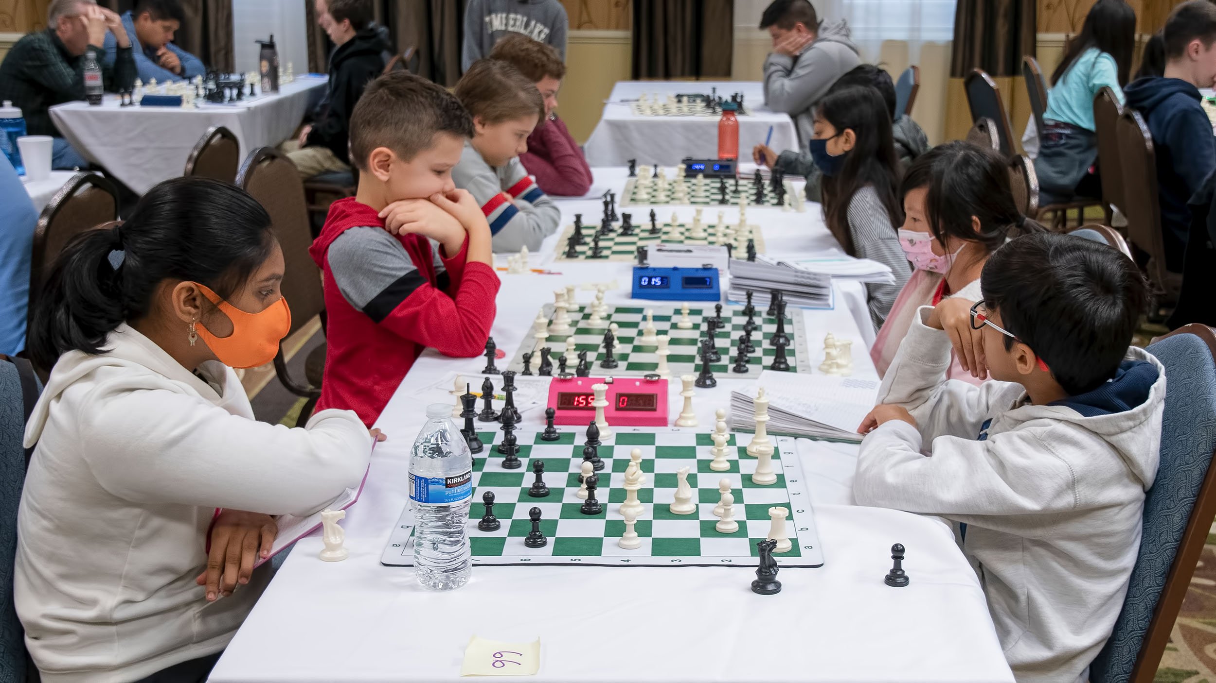 Students check out the CCPS winter chess tournament