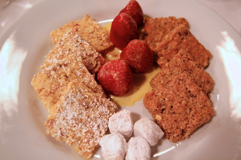 Caramelized s trawberries with z abaglione, Passover h azelnut s ponge c ake, w alnut c ake, and l emon m arzipan