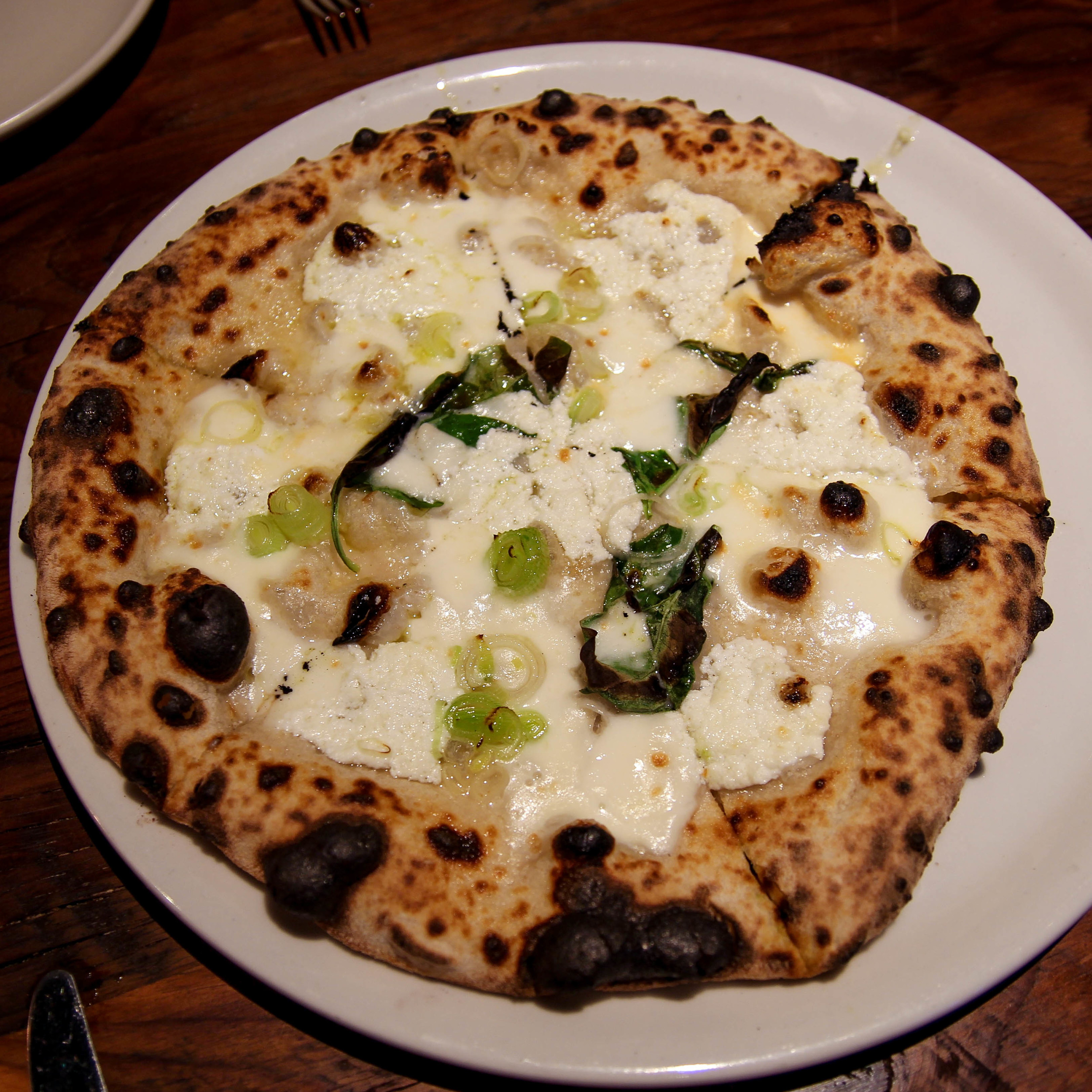 Bianca: mozzarella, ricotta, basil, garlic