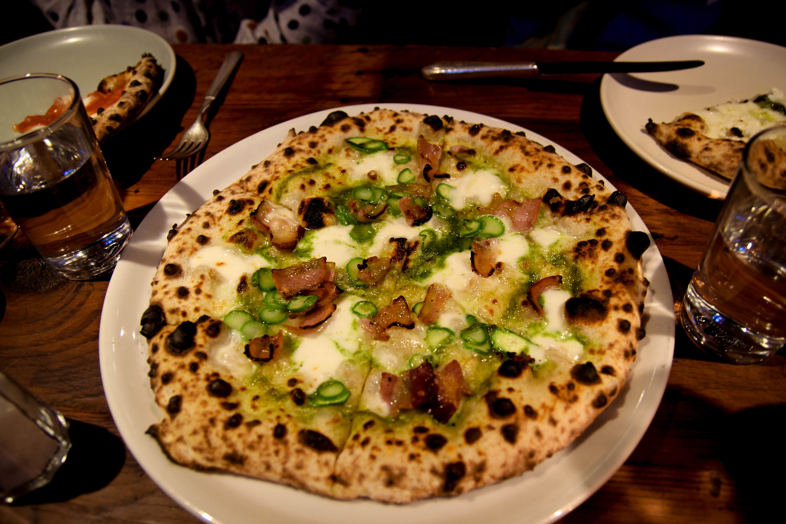 Asparagus: mozarrella, house pancetta, arugula pesto, pecorino
