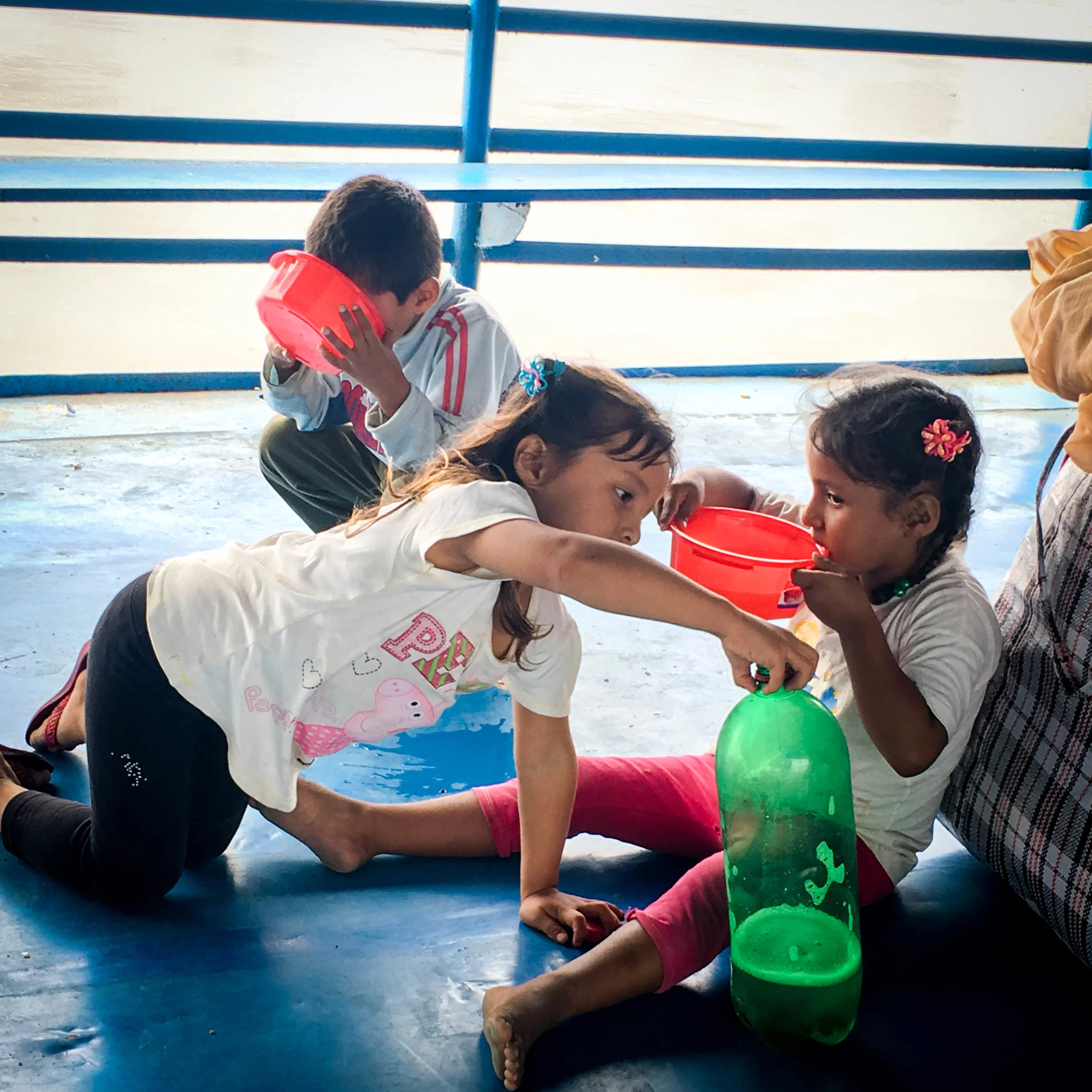 Kids sneaking soft drinks on the boat ride. No wonder they were so hyper.