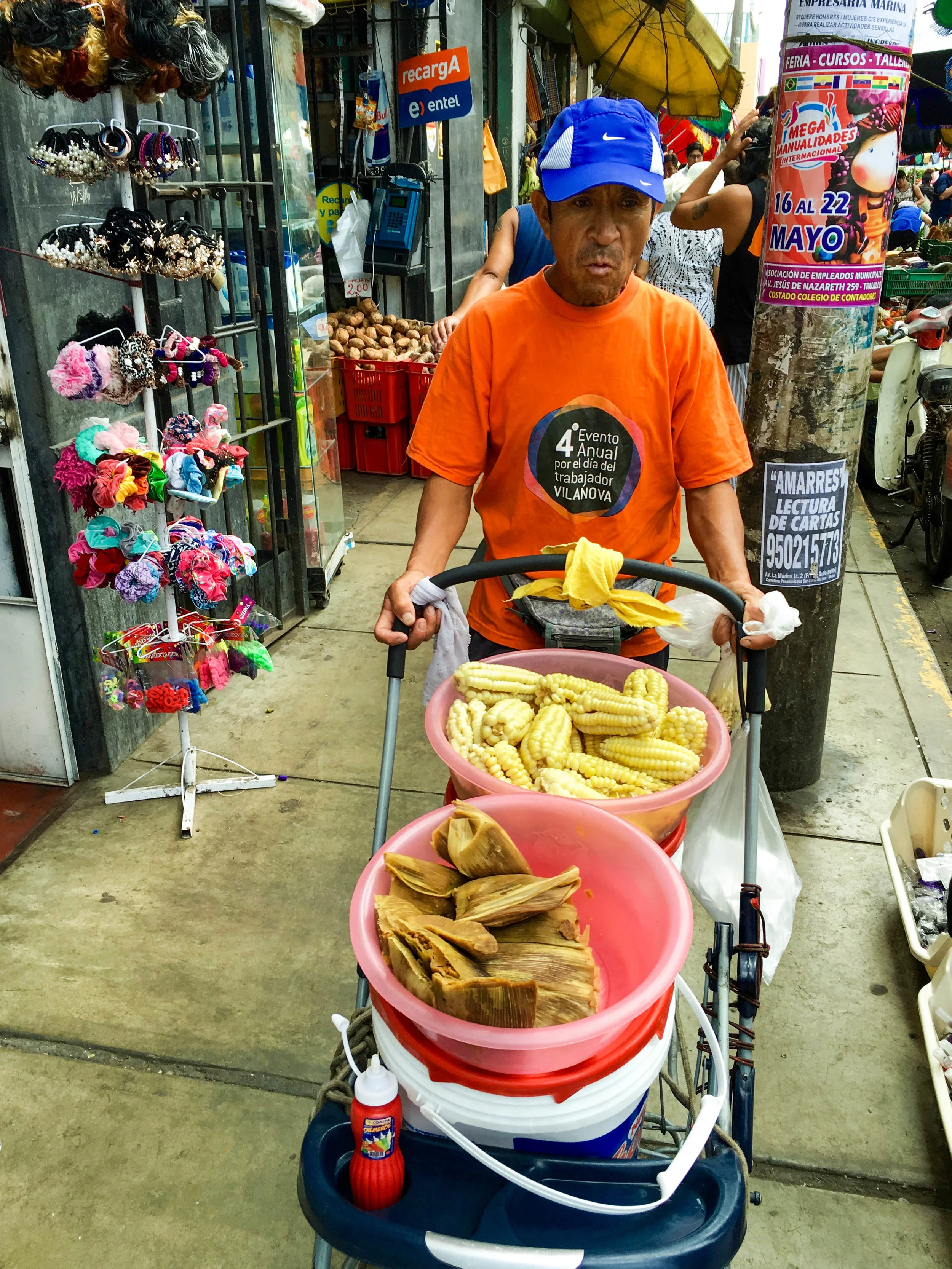 Corn and tamales (made of corn) in a stroller.